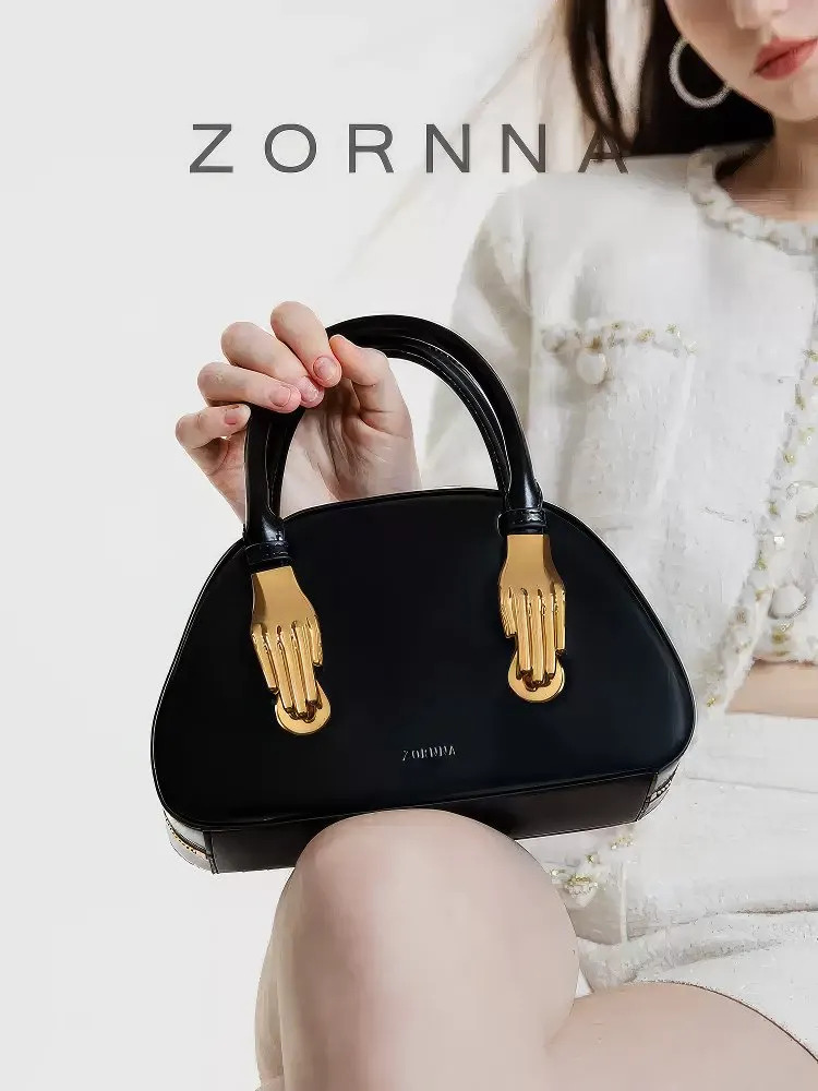 Mini Leather Top Handle Bag with Timeless Designer Appeal