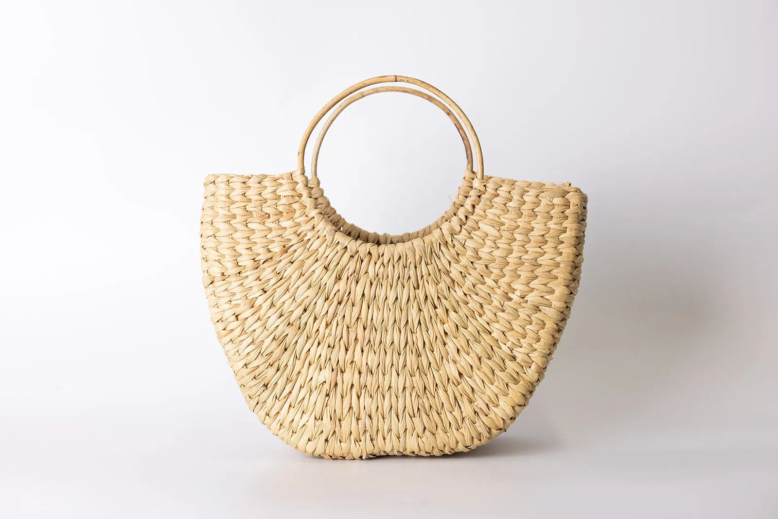 seagrass bag with cane handle