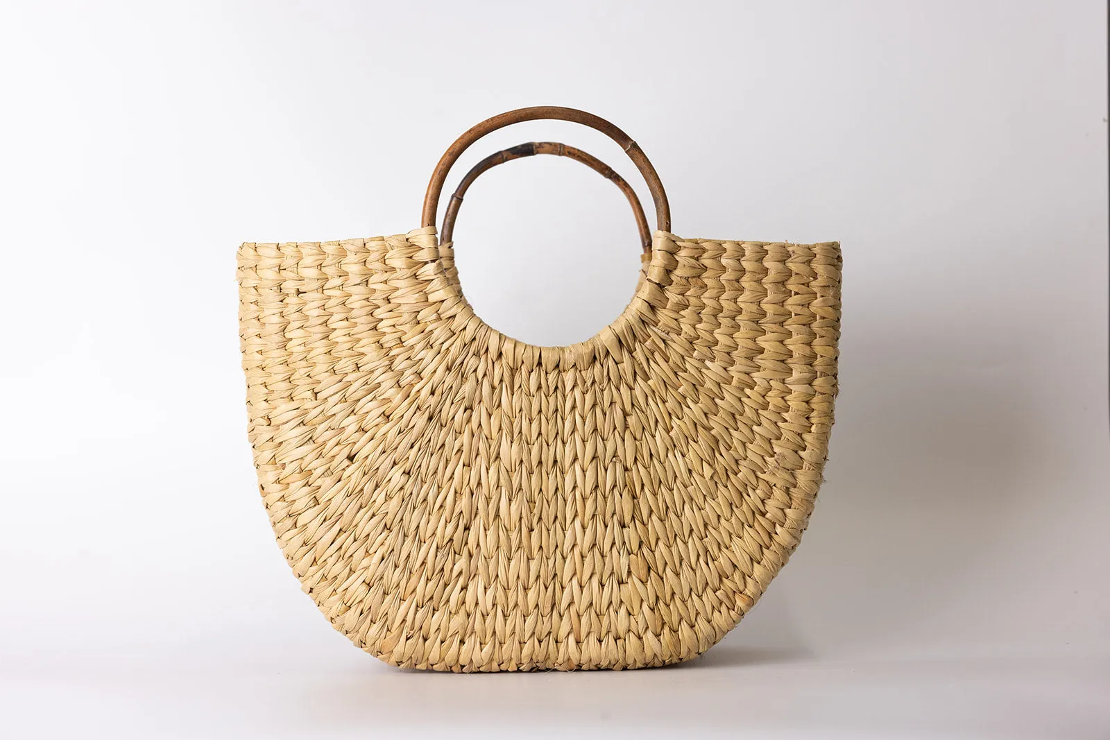 seagrass bag with cane handle