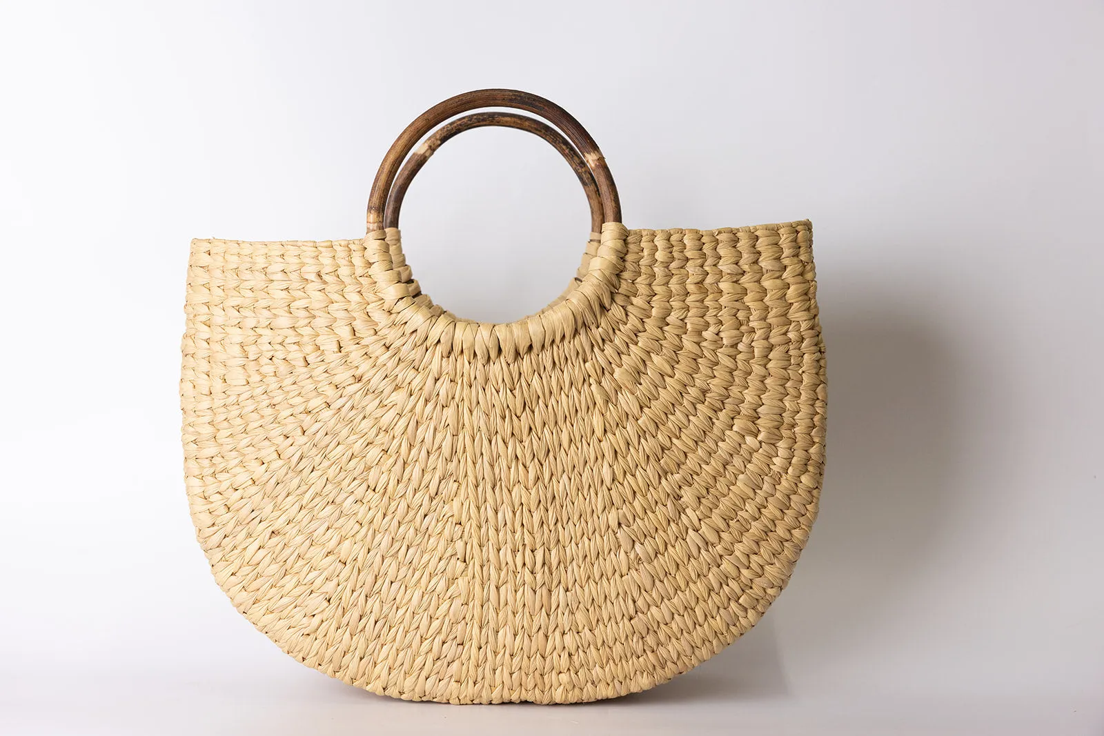 seagrass bag with cane handle